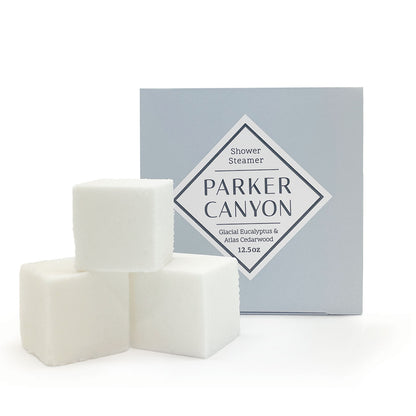 Set of shower steamers with Glacial Eucalyptus & Atlas Cedarwood packaging box on a white background